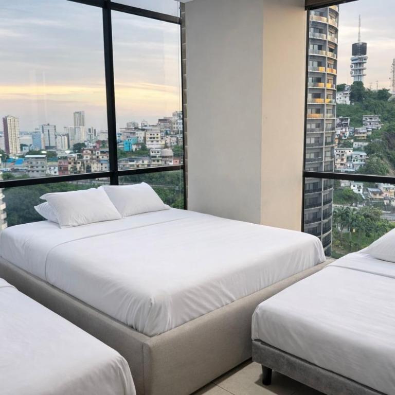 Apartamento moderno con vistas a la ciudad, 2 dormitorios, sala de estar y cocina equipada en la planta superior - Two-Bedroom Apartment with City View - 12