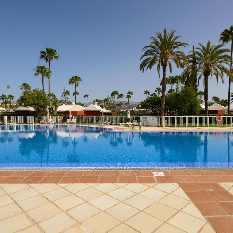 Villa Guerrero - Terraza y acceso a piscina común - Two-Bedroom Villa - 16