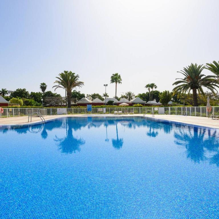 Villa Guerrero - Terraza y acceso a piscina común - Two-Bedroom Villa - 18