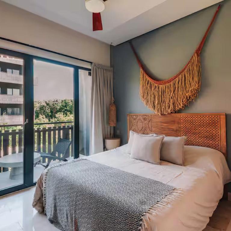 BT Homes - Tulum, Moderno cerca del mar con piscina y balcón - Apartamento con vistas y balcón - 2
