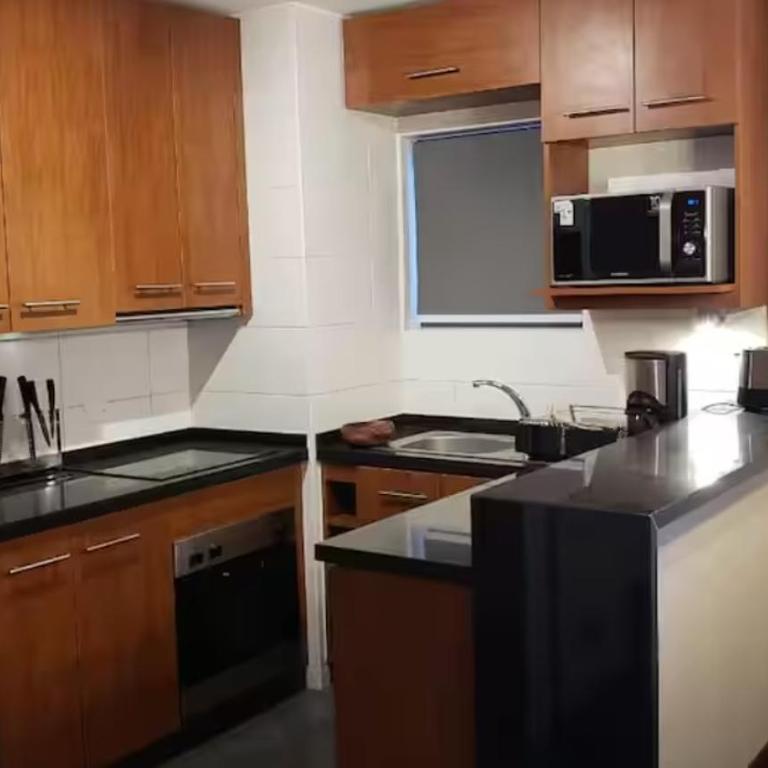 Condominio El Colorado Sky Center - Apartamento Deluxe de 2 dormitorios con vistas al jardín - 1