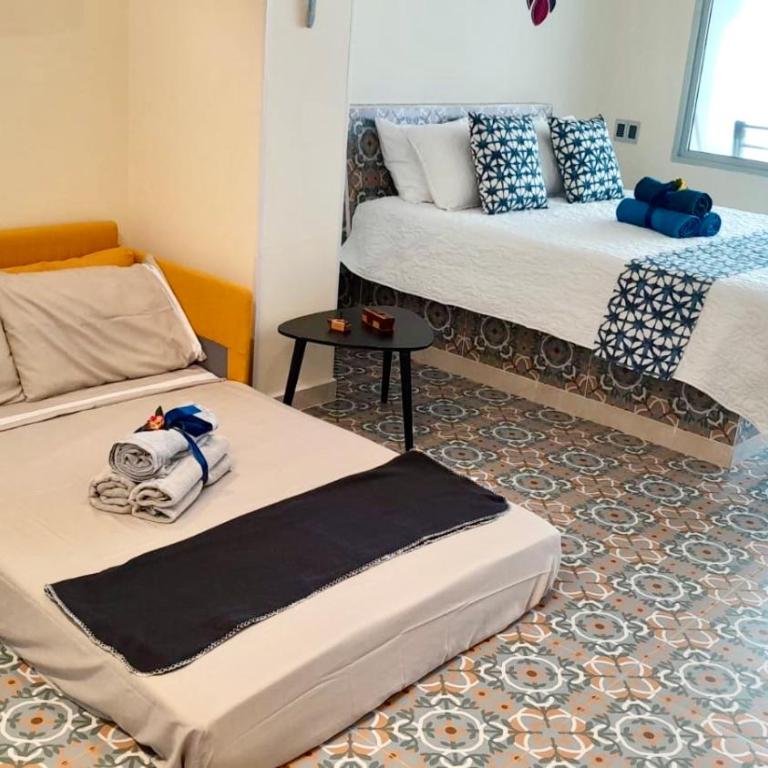 Lovely Suite steps away from the airport and sea - One-Bedroom Apartment with Pool View - 12