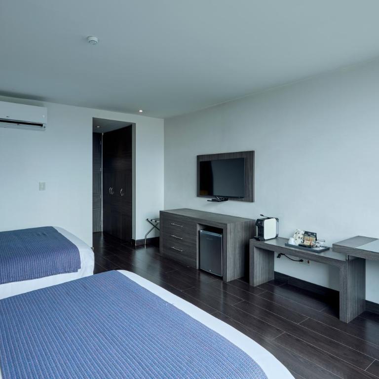 Hotel bh El Poblado - Habitación Doble con 2 camas dobles - 7