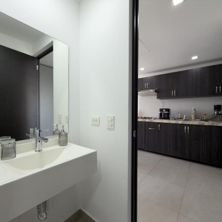 Suite Ejecutiva con Vistas y Estacionamiento - One-Bedroom Apartment - 7