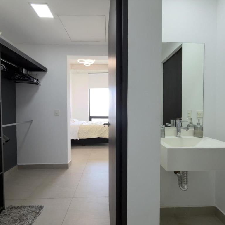 Suite Ejecutiva con Vistas y Estacionamiento - One-Bedroom Apartment - 17
