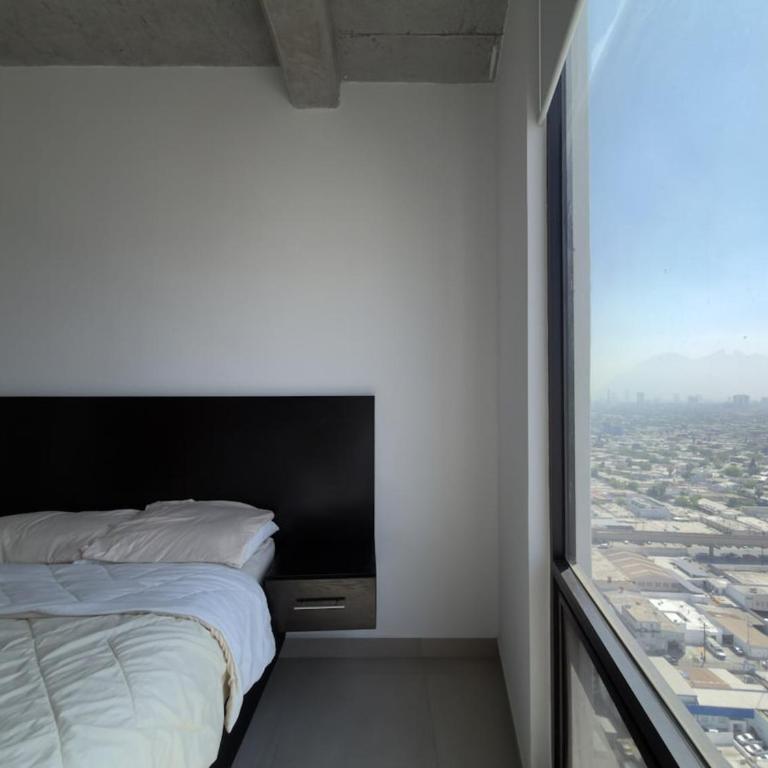 Suite Ejecutiva con Vistas y Estacionamiento - One-Bedroom Apartment - 15