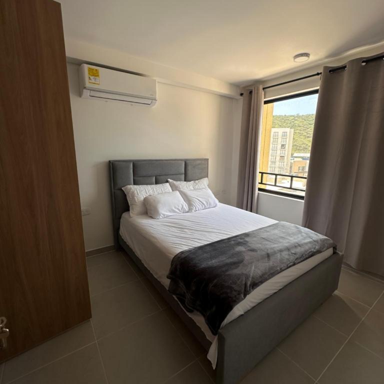 Apartamento Coralina Caribe Residence en Santa Marta cerca al mar - AC, Wifi, balcón, parqueadero - One-Bedroom Apartment - 7