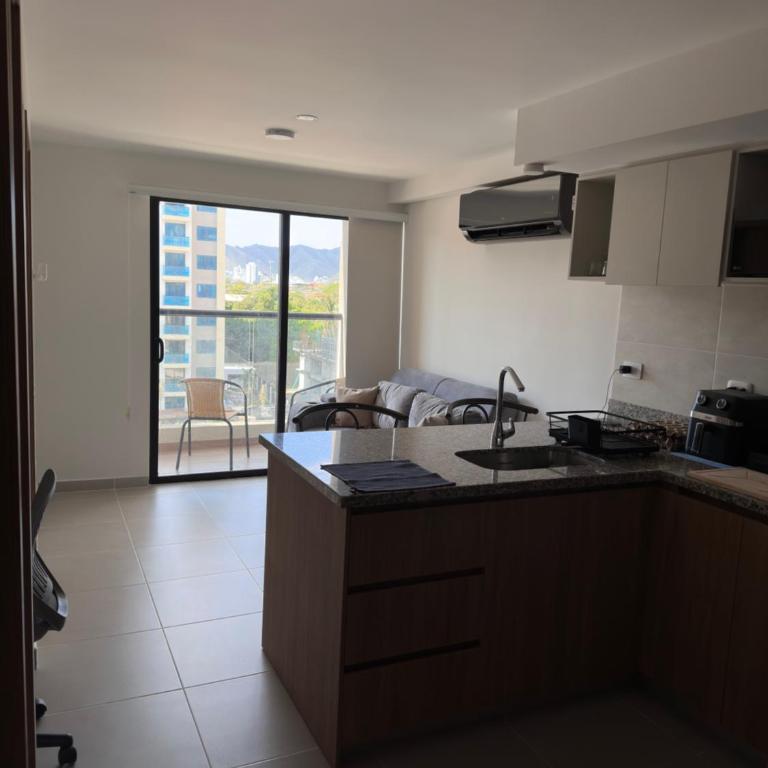 Apartamento Coralina Caribe Residence en Santa Marta cerca al mar - AC, Wifi, balcón, parqueadero - One-Bedroom Apartment - 12
