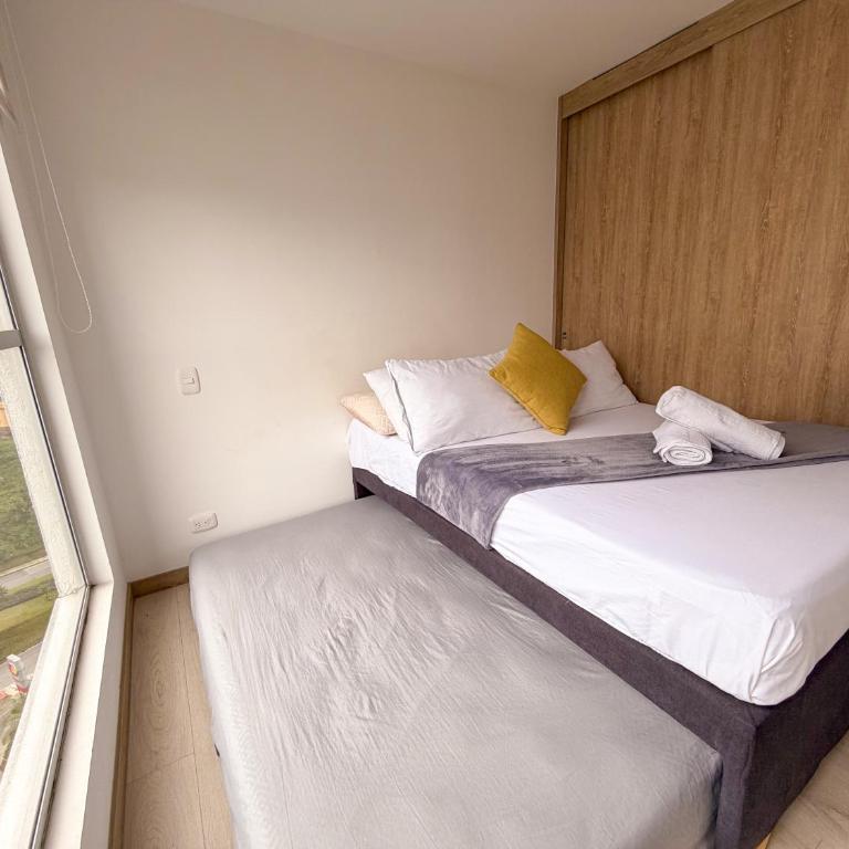 Apartamento moderno con parqueadero gimnasio piscina climatizada y coworking - Ubicación ideal cerca al cable - Apartamento de 2 dormitorios - 12