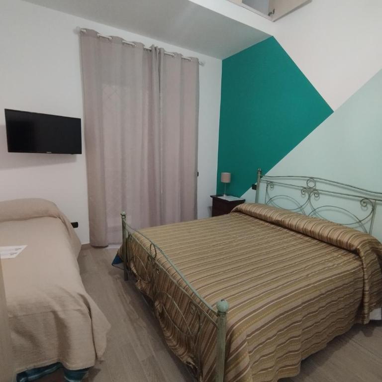Casa La Rosa Rooms- Nel Cuore di Napoli - Camera Tripla - 1