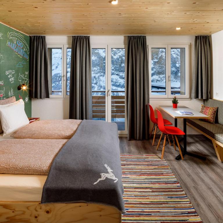 Eiger Guesthouse - Doppelzimmer mit Bergblick und eigenem Bad - 10