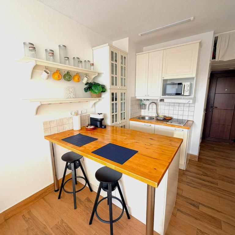Evans Realty CO Estudio en la playa y piscina - Apartamento de 1 dormitorio - 8