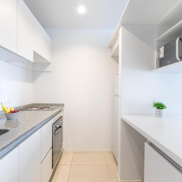 Exclusivo con pileta, cochera, parrilla, cerca del hospital - Apartamento de 1 dormitorio - 7