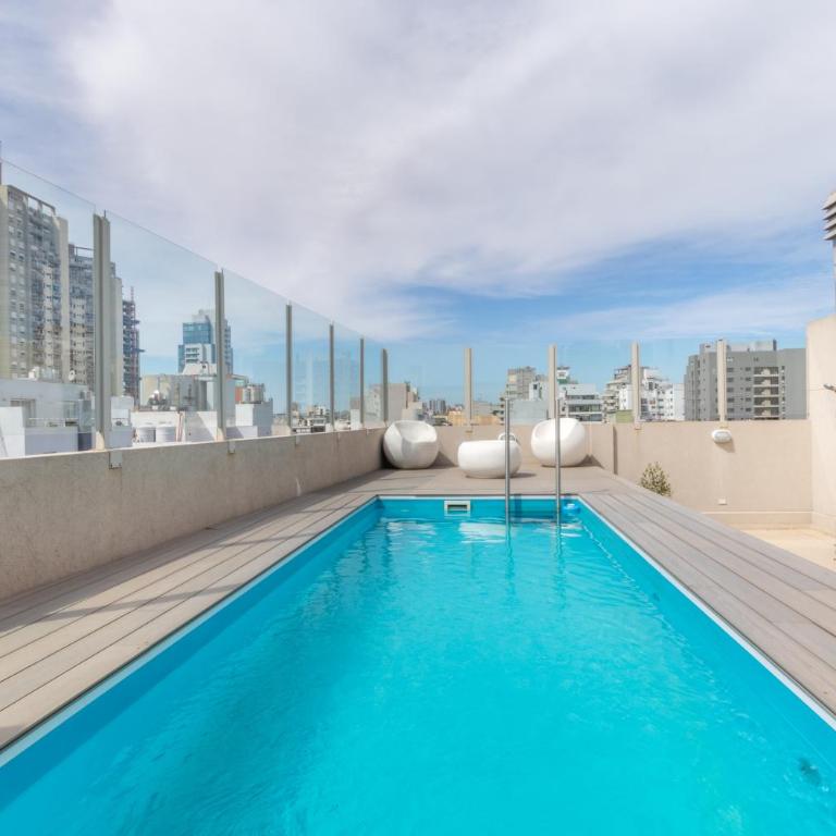 Exclusivo con pileta, cochera, parrilla, cerca del hospital - Apartamento de 1 dormitorio - 40