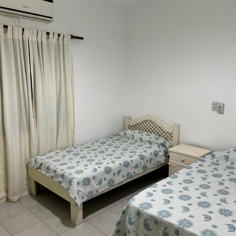 Hermosa Casa con Quincho y pileta - Three-Bedroom House - 8