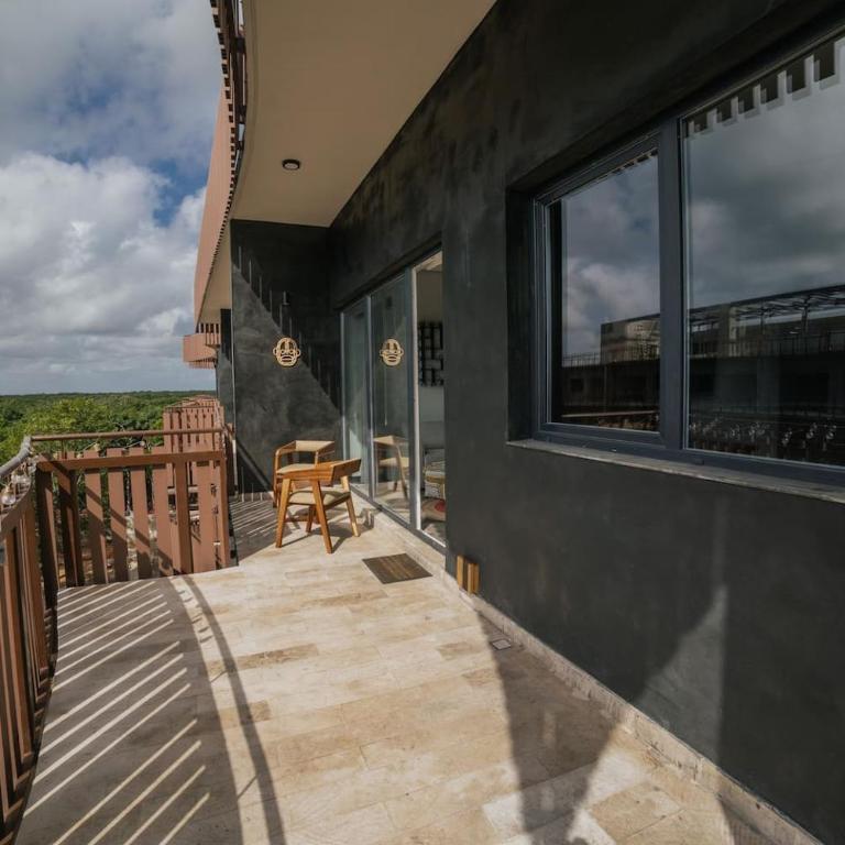 Jungle Guardian - Rooftop Pool & Beach Club in Zona Hotelera Tulum - Two-Bedroom Apartment with Balcony - 10