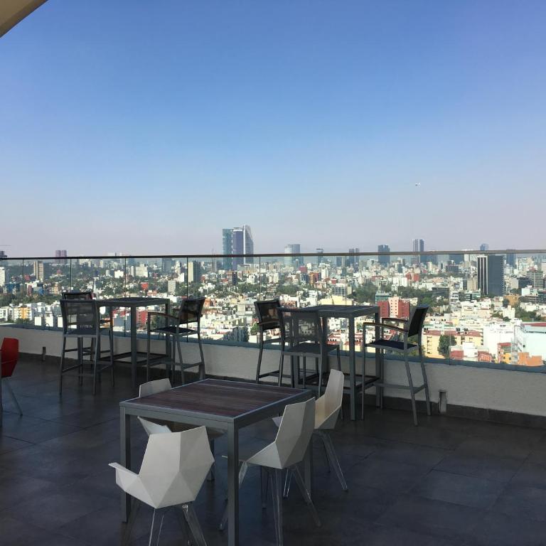 Napoles Condo Suites - Deluxe Double Room with Balcony - 1
