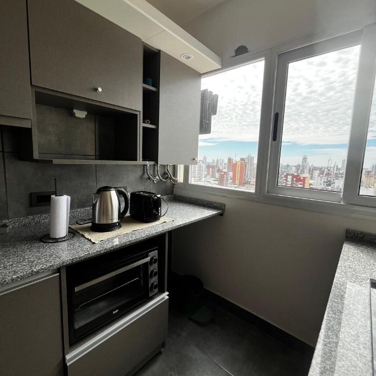 Espacio San Martin - Departamento en plena peatonal con Seguridad 24 hs - One-Bedroom Apartment - 7