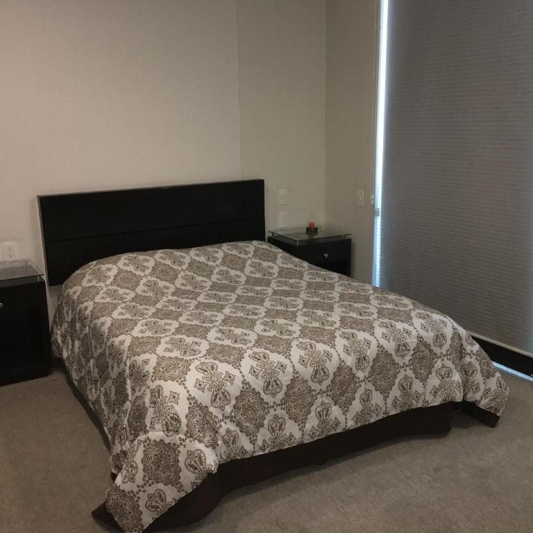 Napoles Condo Suites - Deluxe Double Room with Balcony - 15