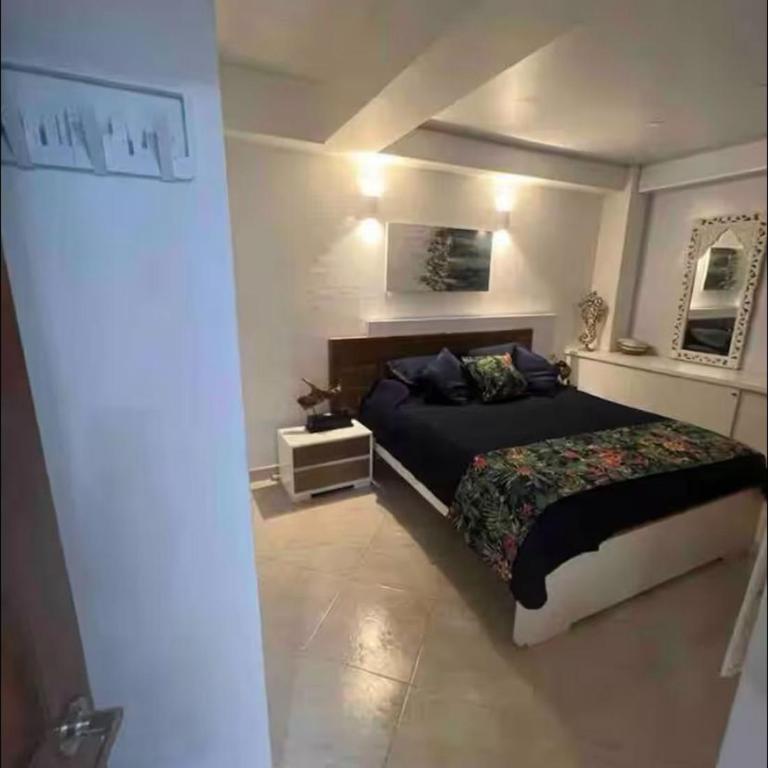 Deluxe Apts pasos de la playa - Apartamento de 3 dormitorios con vistas al océano - 4