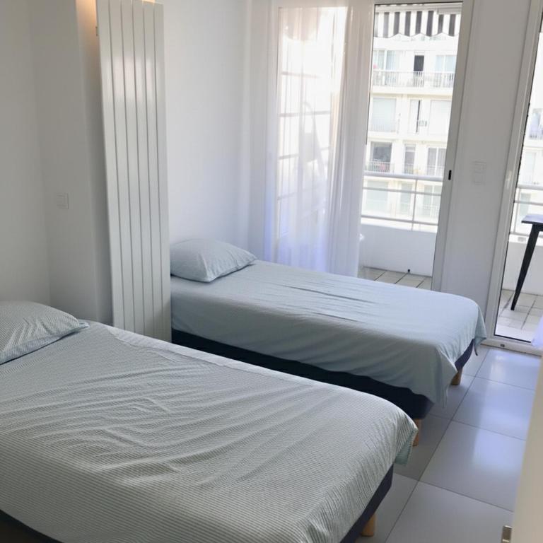Impeccable 3 pièces -Clim -2 terrasses ,la plage à 50m Juan les pins proche Cannes - Two-Bedroom Apartment - 6