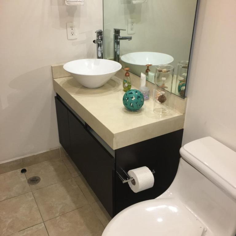 Napoles Condo Suites - Deluxe Double Room with Balcony - 11