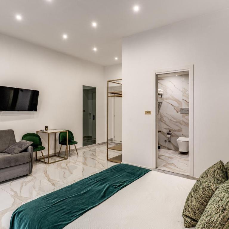 Élite Rooms - Camera Quadrupla Premium - 6