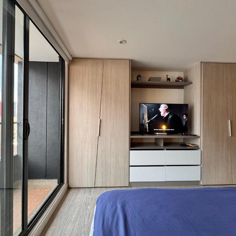 Modernos en Chapinero balcon terraza coworking gimnasio - One-Bedroom Apartment - 33
