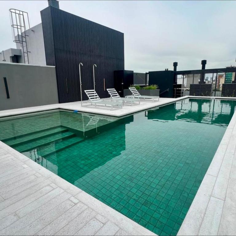Modern Central location Studio with Rooftop Pool - One-Bedroom Apartment - 24