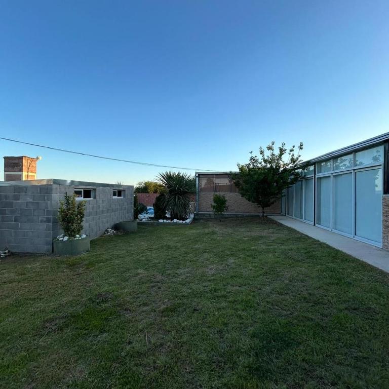 La casa de Patricia - Three-Bedroom House - 16