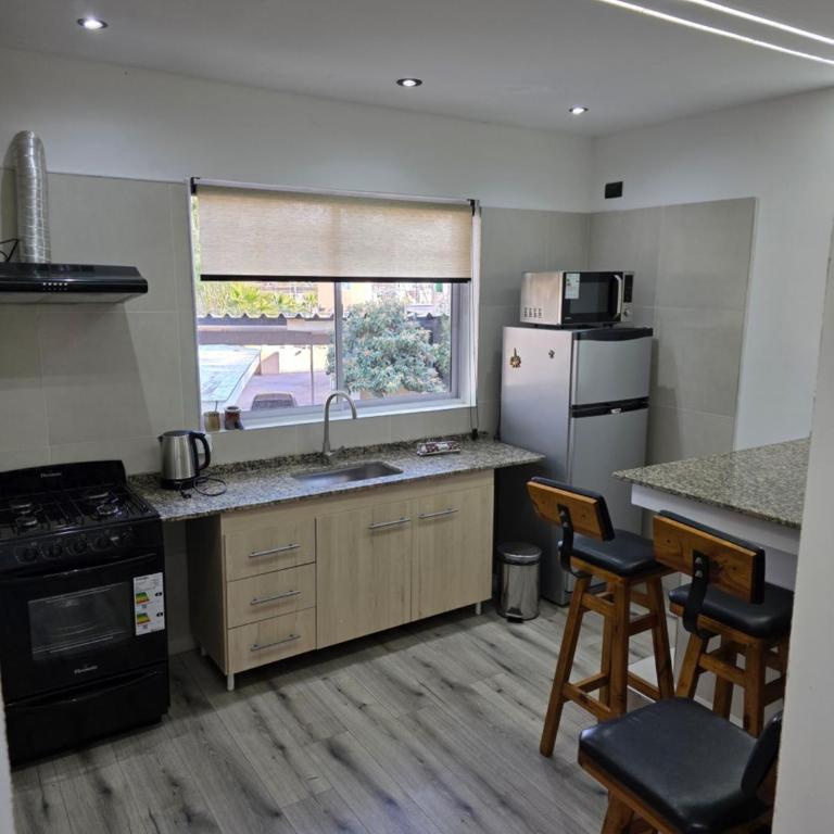 Complejo Turístico Mendoza - Apartamento de 1 dormitorio con vistas al jardín - 8