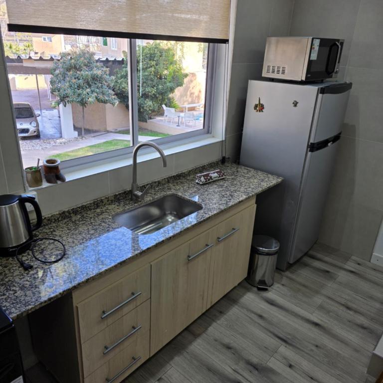Complejo Turístico Mendoza - Apartamento de 1 dormitorio con vistas al jardín - 9