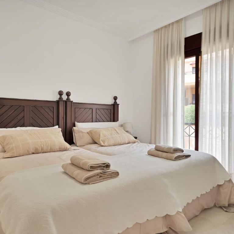 Lujoso adosado frente al mar con piscina y jardín - RIVIERA ANDALUZA 3 - Casa de 3 dormitorios - 5