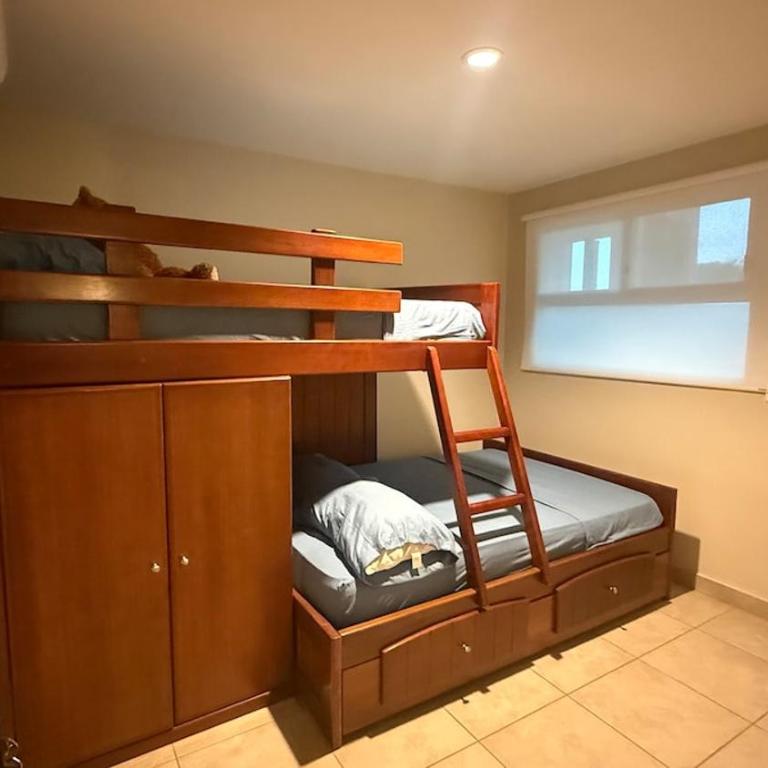 Condo with pool and private beach - Three-Bedroom Apartment - 2