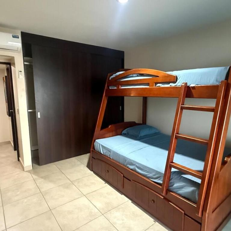 Condo with pool and private beach - Three-Bedroom Apartment - 3