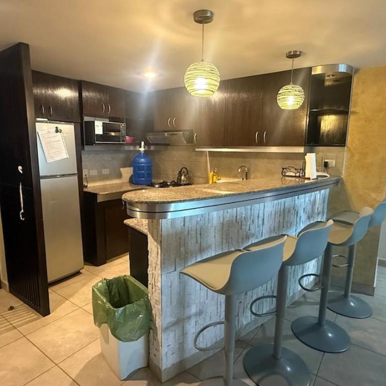 Condo with pool and private beach - Three-Bedroom Apartment - 9