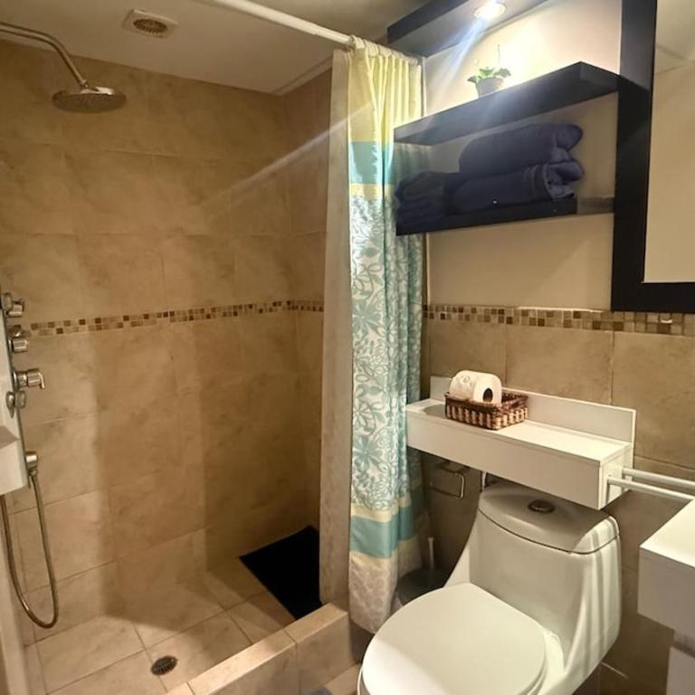 Condo with pool and private beach - Three-Bedroom Apartment - 16