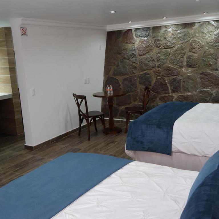 Hotel Tierras Blancas - Habitación Doble - 2 camas dobles - 4