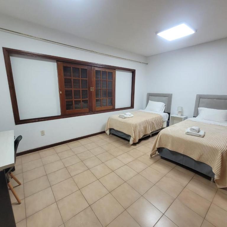 BauHouse Comfort Suites Asuncion - Habitación Doble con vistas a la piscina - 2 camas - 6
