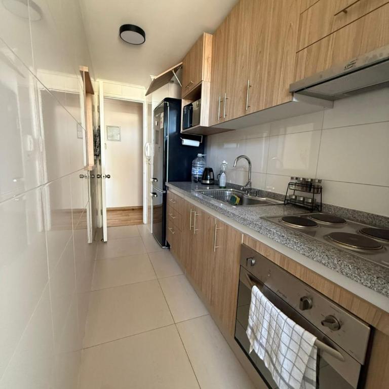 Departamento con piscina y Estacionamiento, A Pasos del Casino Antay - One-Bedroom Apartment - 9