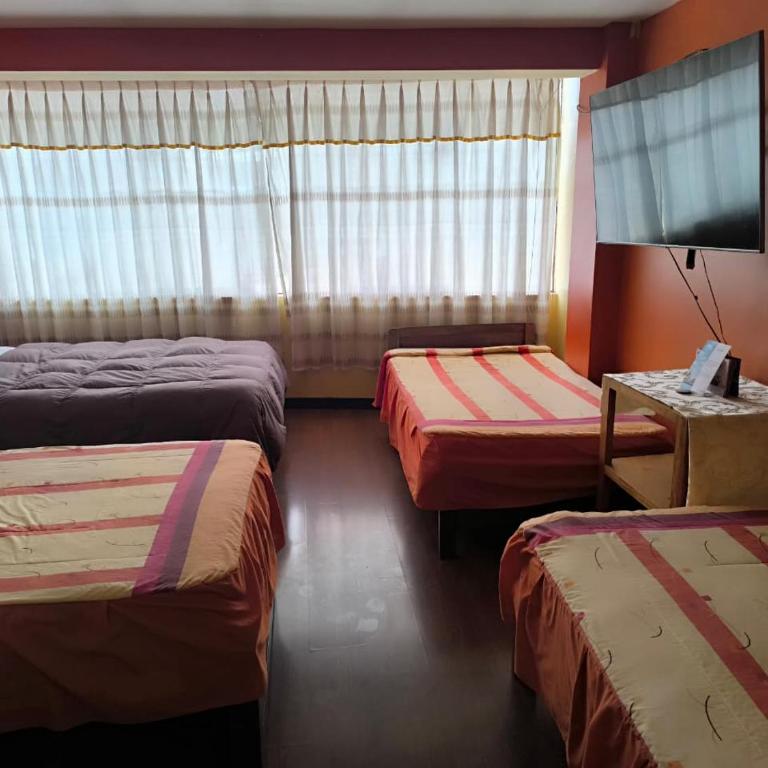 Andenes D'Orion Puno - Habitación Cuádruple con baño privado - 19