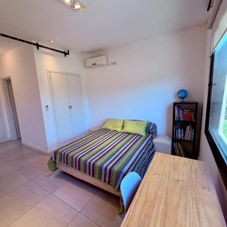 Casa con jardín y piscina en Estancias del Pilar - Casa de 4 dormitorios - 18