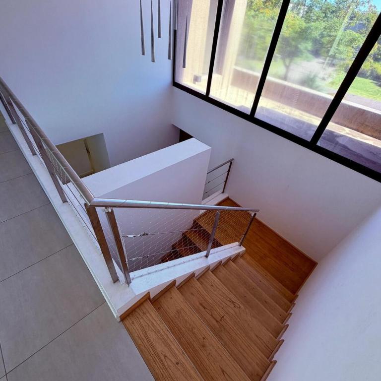 Casa con jardín y piscina en Estancias del Pilar - Casa de 4 dormitorios - 19