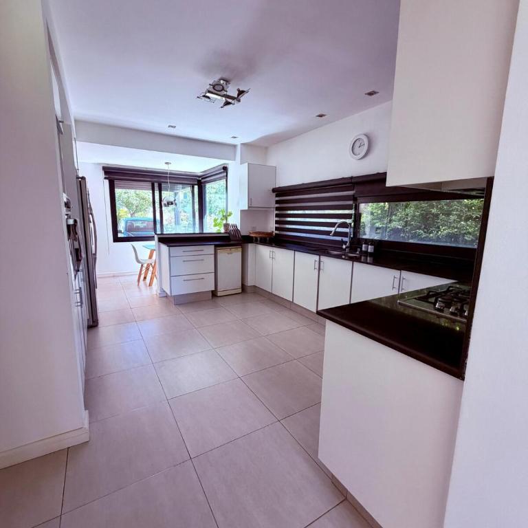 Casa con jardín y piscina en Estancias del Pilar - Casa de 4 dormitorios - 21