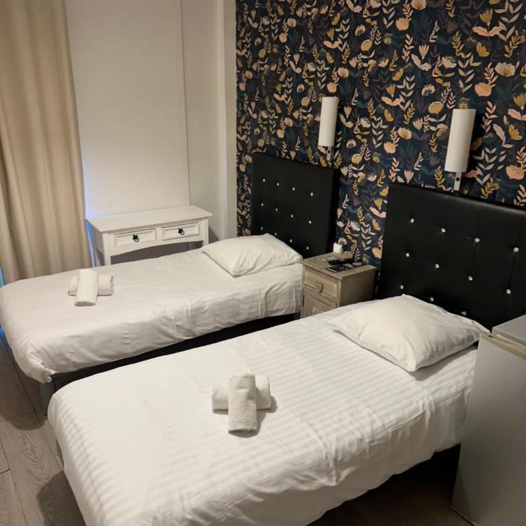 Hôtel Trianon - Chambre Lits Jumeaux - 7
