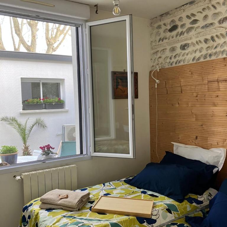 Toulousaine arborée - parking public - Chambre Double avec Salle de Bains Commune - 63