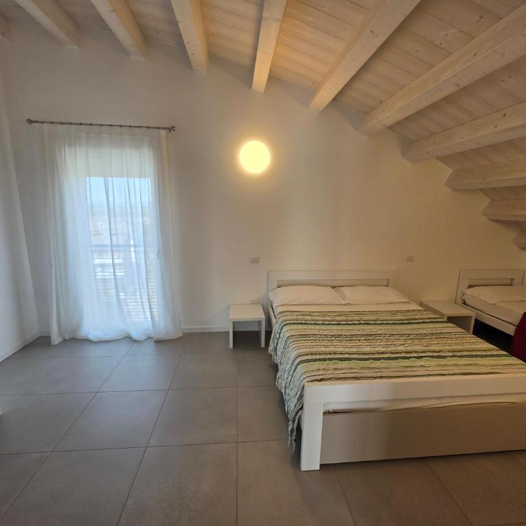 Residence Al Molo - Suite Porta del Mar Sea View - Agenzia Cocal - Appartamento con 3 Camere da Letto - 11