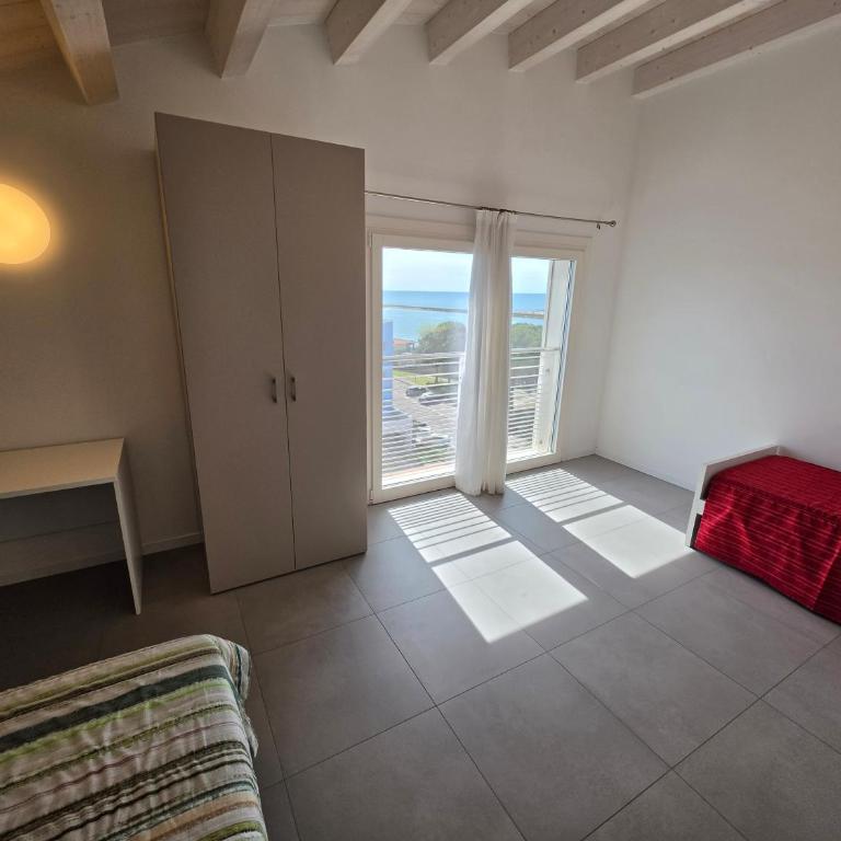 Residence Al Molo - Suite Porta del Mar Sea View - Agenzia Cocal - Appartamento con 3 Camere da Letto - 9