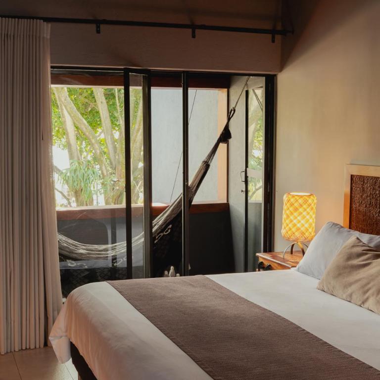 Sui Boutique Hotel - Suite con cama grande y balcón - 6