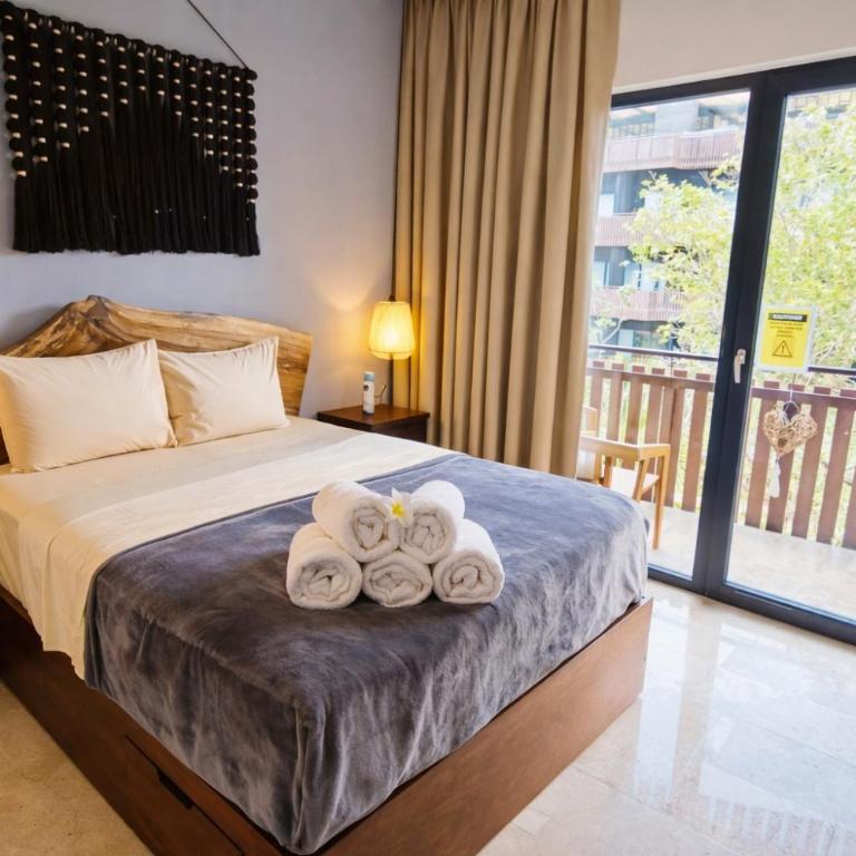 Jungle Guardian - Rooftop Pool & Beach Club in Zona Hotelera Tulum - One-Bedroom Apartment with Balcony and Water View - 1